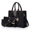 Three-piece set of black faux leather tote bags with gold leaf pendant detail - Black