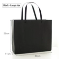 Grande sacchetto regalo nero opaco minimalista con manici in elegante design tote - Grande / Nero