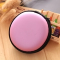 Pink EVA circular mini coin purse and headphone organizer case on wooden desk - Pink