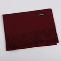 Solid dark red cashmere scarf with fringe tassels shown in a folded flat lay view - Burgundy / 68x200cm