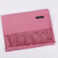 Pink cashmere scarf with fringe tassel detail folded on textured white background - Dusty Pink / 68x200cm