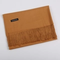 Caramel cashmere scarf with tassels in a classic plain fold on a white background - Camel / 68x200cm