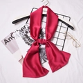 Elegant solid red narrow silk scarf tied on a hanger with stylish fashion accessories - Rose Red