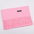 Pink cashmere feel scarf with tassels and product label on a plain white background - Hot Pink / 68x200cm