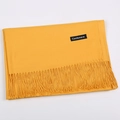 Soft yellow cashmere shawl with classic fringe details and elegant material label - Ginger Yellow / 68x200cm
