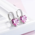 Silver-finish heart hoop earrings featuring pink cubic zirconia and pavé-set accents - Pink Zirconia