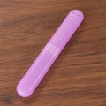 Portable purple translucent toothbrush storage case with a minimalist engraved smiley face - Transparent Purple