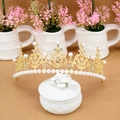 Elegant gold baby tiara crown with white pearls and rhinestones on rose jewelry box - Alloy Small Gold 021