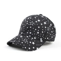 Detailed close-up of a black baseball cap featuring white star prints and cotton twill texture - Adjustable / Pentagram Print - Black