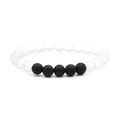 Detail of 8mm white frosted beads and black volcanic lava stone stretch bracelet - White Stone + Lava Stone