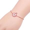 Bracciale regolabile in oro rosa con mela in smalto rosa e pietre di zircone - Oro rosa