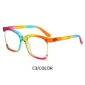 Rainbow gradient half-rim eyeglasses with transparent frame and golden metal accents - Colorful