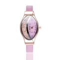 Detail of rose gold oval watch case with pink leather strap and moving sand crystals - Pink