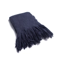 Close-up of thick navy blue knit scarf with long fringes and soft wool-like texture - Navy Blue