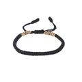 Handmade woven bracelet in black with colorful knotted accents and adjustable closure - Multicolor and Black