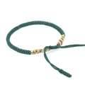 Handmade woven dark green Vajra knot bracelet with colorful adjustable nylon cord detail - Multicolor and Dark Green