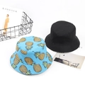 Bob réversible avec imprimé ananas et design noir uni pour une protection solaire estivale - Taille unique / Imprimé Ananas - Bleu Lac