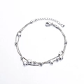 Double-layered silver bracelet with frosted star charms and polished round beads decoration - Double Layer Star Bracelet