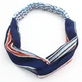 Elastic crossed headband featuring classic navy and orange stripes in soft ribbed fabric - Irregular Colorful Stripes