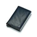 Detail of dark blue lychee leather RFID wallet with pop-up aluminum card holder mechanism - Royal Blue