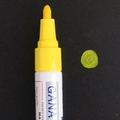 Yellow oil-based paint marker pen with felt tip on black background for wedding sign-in - Yellow