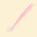 Pink silicone baby training spoon with soft textured heart and flower relief handle - Pink