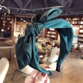 Dark green satin headband featuring a large bow knot and comfortable fabric wrap - Dark Green