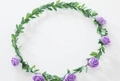 Floral wreath headpiece featuring six purple foam roses and green faux leaves - Purple