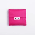 Foldable rose red shopping bag in square shape with a BAG label on the front - Rose Red