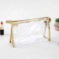 Transparent PVC makeup bag with gold synthetic leather trim and a top zipper closure - Medium / Gold