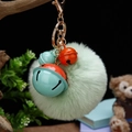 Porte-clés en peluche vert clair avec grelots orange et bleu sur attache métallique - Emballage unique en sac OPP / Cloche Orange Verte + Vert Menthe