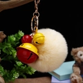 Porte-clés mignon avec pompon en peluche beige, cloches rouges et fermoir doré - Emballage unique en sac OPP / Cloche Orange Jaune + Beige