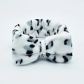 Plush animal print bow wristband in soft white and black flannel for face washing - White Leopard Print