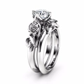 Silver rose ring set with a central brilliant-cut diamond and carved leaf details - US 7 / Silver