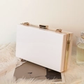 White acrylic evening clutch bag with gold metal frame and minimalist chain strap - White