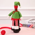 Christmas elf wine bottle cover in red and green plush fabric for holiday table decor - Polka Dot Hat Style