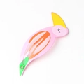 Detail of pink cartoon bird hair clip with yellow crown and green tail accents - Flamingo