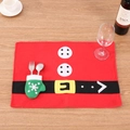 Christmas Santa felt placemat with cutlery pocket on light wood table background - Snowflake Glove Placemat