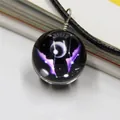 Cosmic sphere necklace featuring deep purple nebula pattern on a black woven cord - Gemini