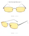 Detail view showing front and side profile of silver rectangular sunglasses with yellow lenses - Silver Frame Light Yellow Lens