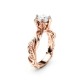 Roségouden ring met bladmotief en fonkelende ronde zirkonia steen in natuurlijke stijl - US 6 / Roségoud