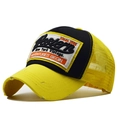Cappellino trucker Western con rete gialla, cotone nero e ricamo in stile vintage - Giallo