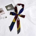 Detailed close-up of long narrow silk twilly scarf with geometric patchwork pattern - Contrast Color