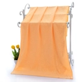 Absorbent orange microfiber towel featuring 3D embossed bear and floral patterns - Orange