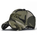 Close-up of the detailed SWAT 3D embroidery on a woodland camouflage cotton baseball cap - Adjustable / Camouflage