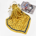 Elegant yellow silk scarf with blue polka dots placed on a white leather handbag - FJ126-Yellow (Polka Dot)