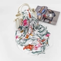 Floral satin square scarf with pink lilies and green vines draped on white handbag - FJ124-White