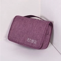Hanging travel toiletry bag in purple cationic fabric with stylish toiletry line art - Purple