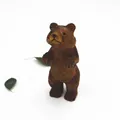 Hand-carved wooden standing bear figurine in dark brown finish with natural wood grain - Standing Brown Bear / Brown