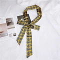 Yellow paisley narrow silk scarf tied in a neat bow, elegant accessory for women - Yellow Paisley